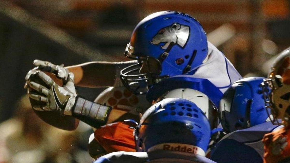 Bracken County's Griffin Appleman reaches across the goal line for a first half touchdown as the first half clock expires with Paris 14, Bracken County 7 at the half on Friday September 30, 2016 in Paris, Ky.