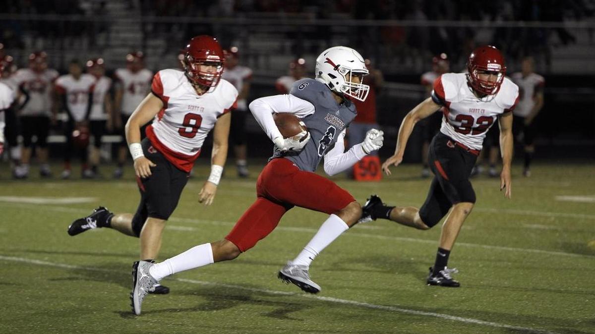 Lafayette's Dekwan Edwards runs against Scott Co. in the Blanton Collier Kickoff Classic at Ishmael Stadium in Lexington, Ky., Friday, August 25, 2017.