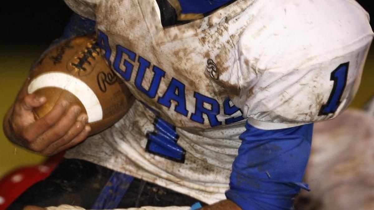 File photo: East Jessamine's Camron Thomas carried the ball in the first half of the East Jessamine at West Jessamine football game in Nicholasville, Ky., Friday, Oct. 9, 2009. The Jaguars, whose program began in 1997, won their first district title in school history on Friday.