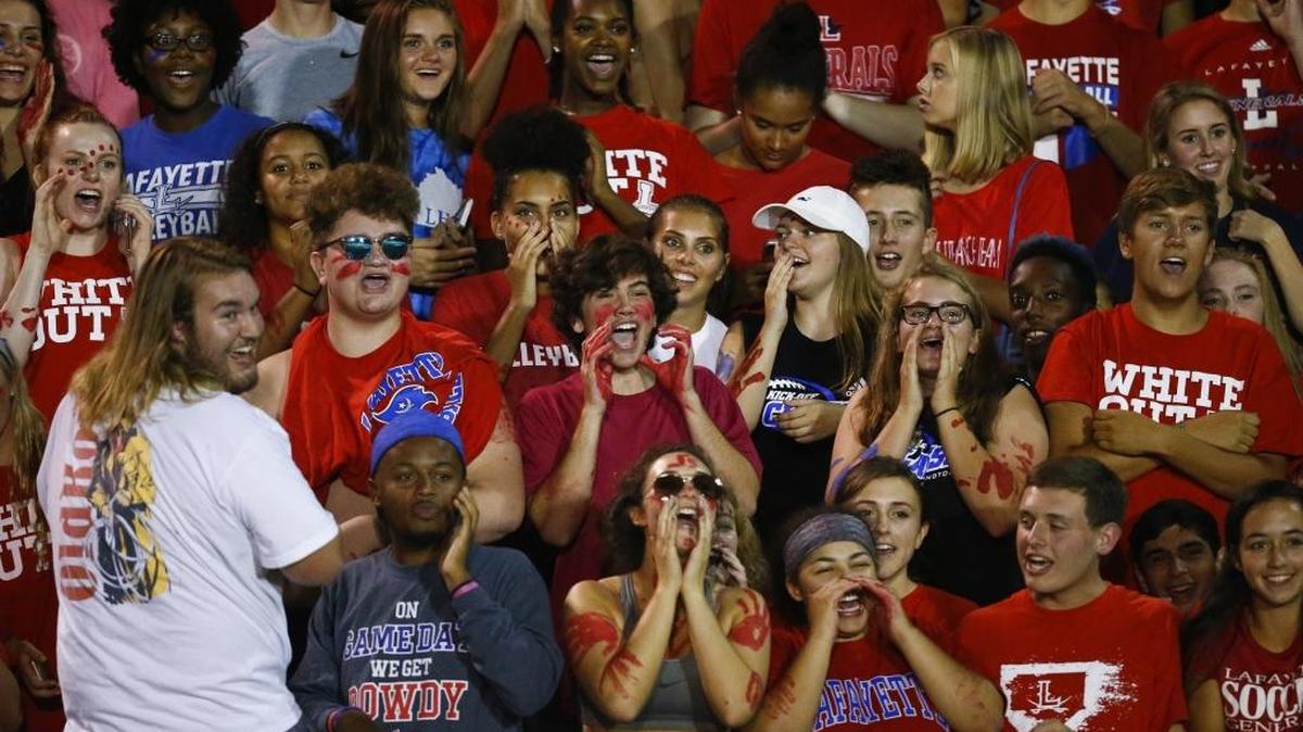 Lafayette fans cheer from the stands during the Adidas Kickoff Classic against Bryan Station at Tates Creek High School, Friday, Aug. 18. 2017.