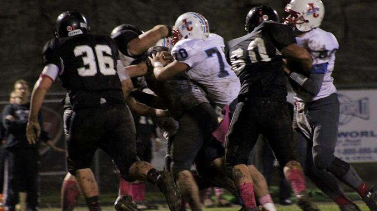 Allen Central (white jerseys) and South Floyd will play their final football game against each other on Friday, Sept. 15, 2016. This photo is from Oct. 17, 2014, when South Floyd got its most recent win in the series, which dates back to 1993.