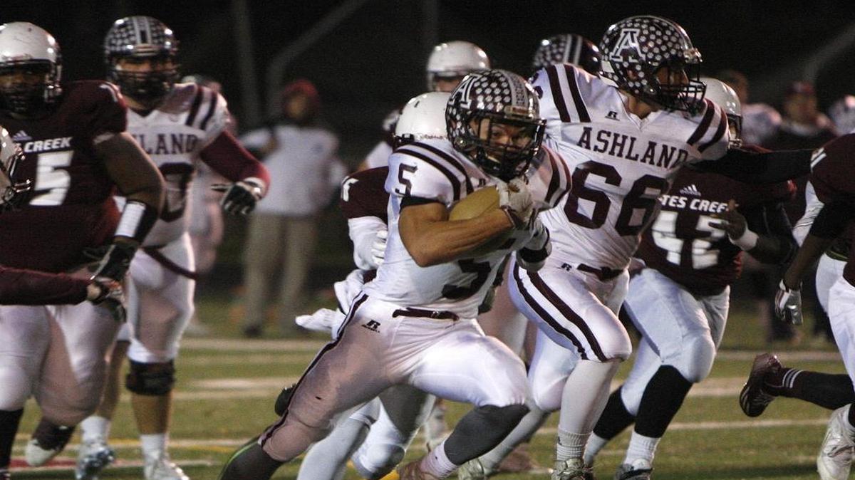 Ashland Blazer running back Quinton Baker runs against Tates Creek at Tates Creek football stadium in Lexington, Ky., Friday, October 30, 2015.