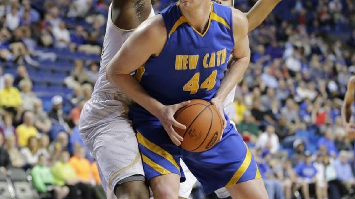 Newport Central Catholic's Ben Weyer (44) got around Murray defense in the first quarter of the Murray vs Newport Central Catholic 2016 Whitaker Bank/KHSAA Boys Sweet 16 basketball tournament quarterfinal game at Rupp Arena in Lexington, Ky., on March 18, 2016.