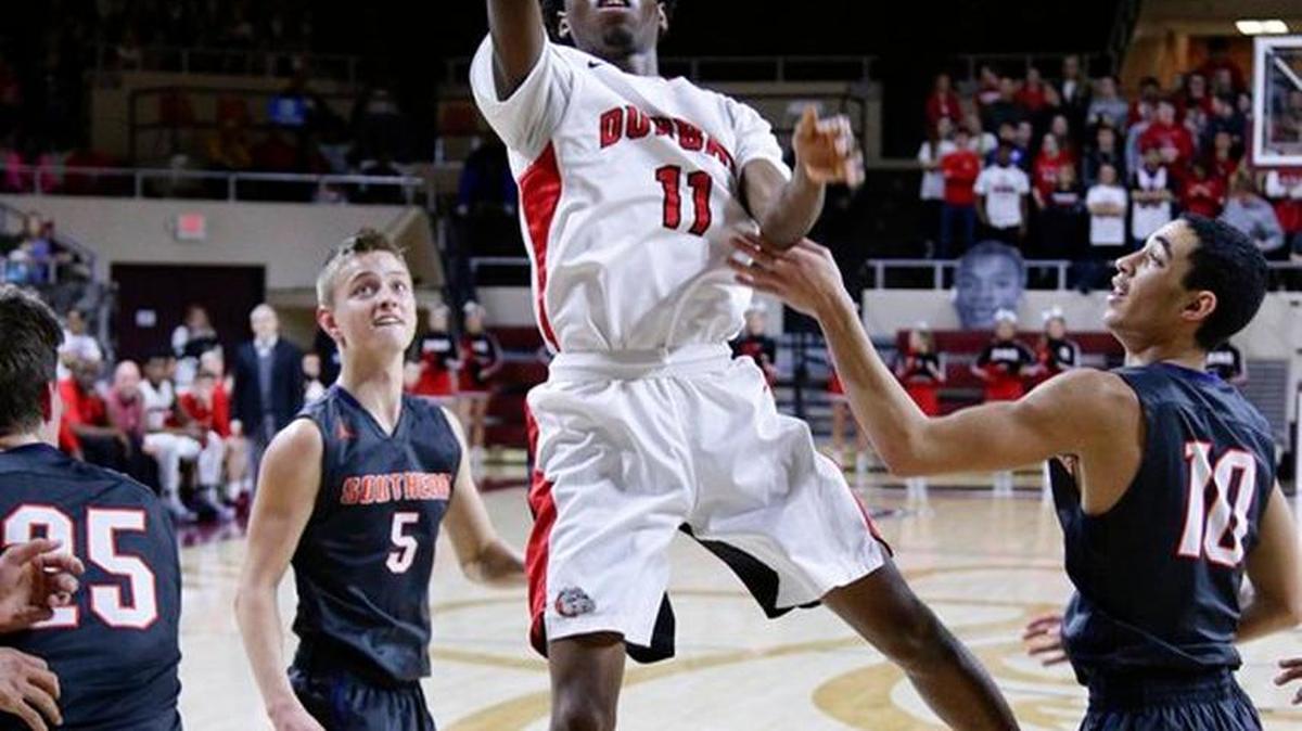 Taveion Hollingsworth scored for Paul Laurence Dunbar during Thursday night’s game at EKU against Madison Southern.