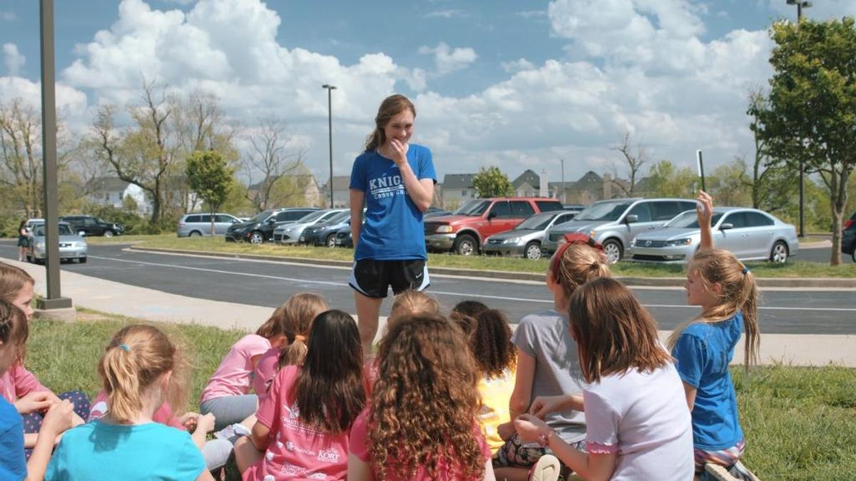 Lexington Catholic senior Michaela Reinhart spoke with children at the Girls on the Run Central Kentucky chapter in Lexington on Thursday, April 20, 2017.