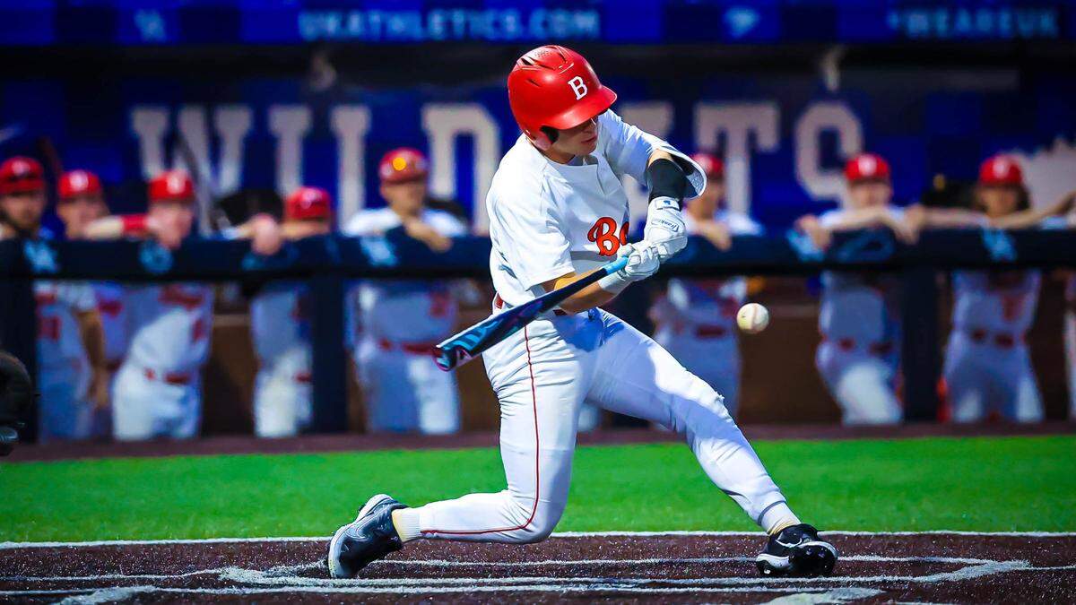 Boyd County’s Conner Davis turns on a pitch during the Lions’ rain-delayed game against Wolfe County in the state baseball tournament at Kentucky Proud Park on Saturday.