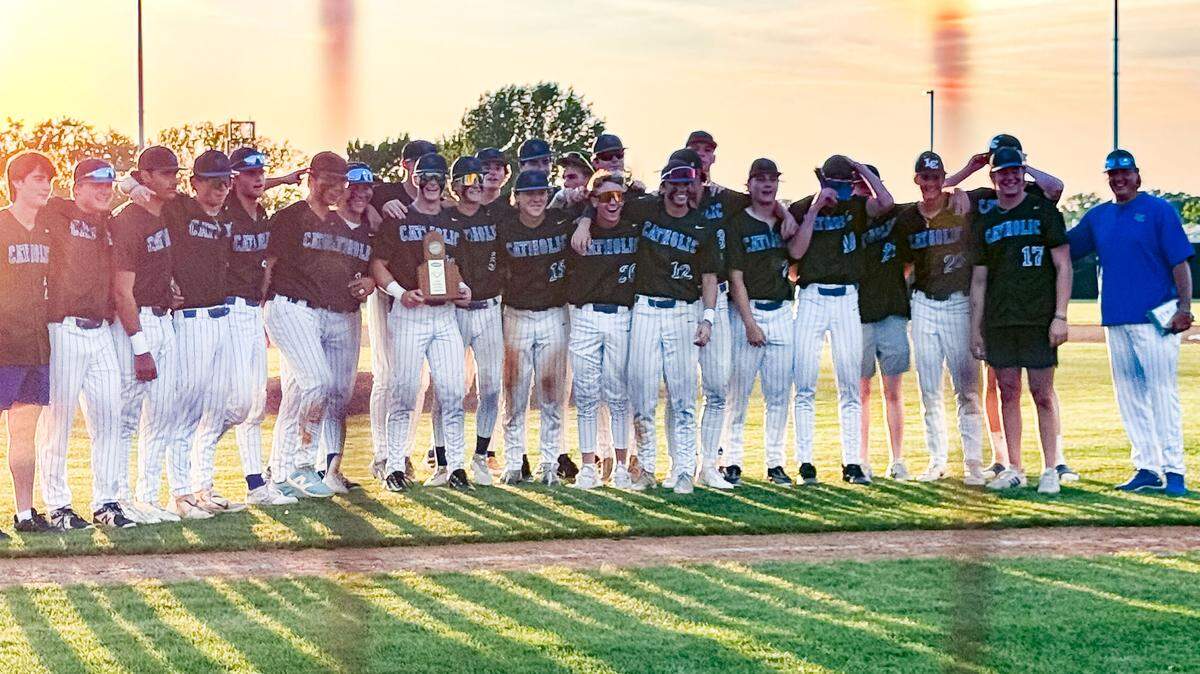 Lexington Catholic poses for pictures after defeating Tates Creek 6-2 in the 43rd District baseball tournament championship game at Tates Creek High School on Tuesday.