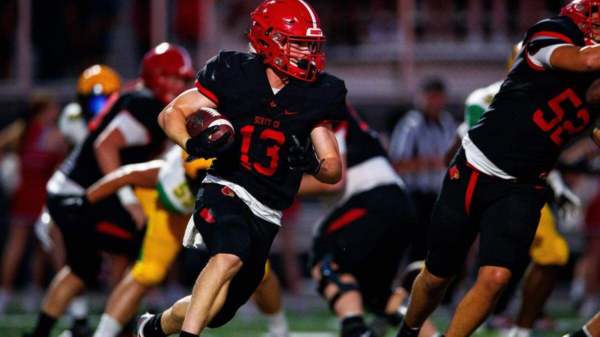 Scott County running back Thomas Feickert carried the ball against Bryan Station on Sept. 9 at Great Crossing High School. Feickert scored two TDs on Friday against Lexington Catholic.