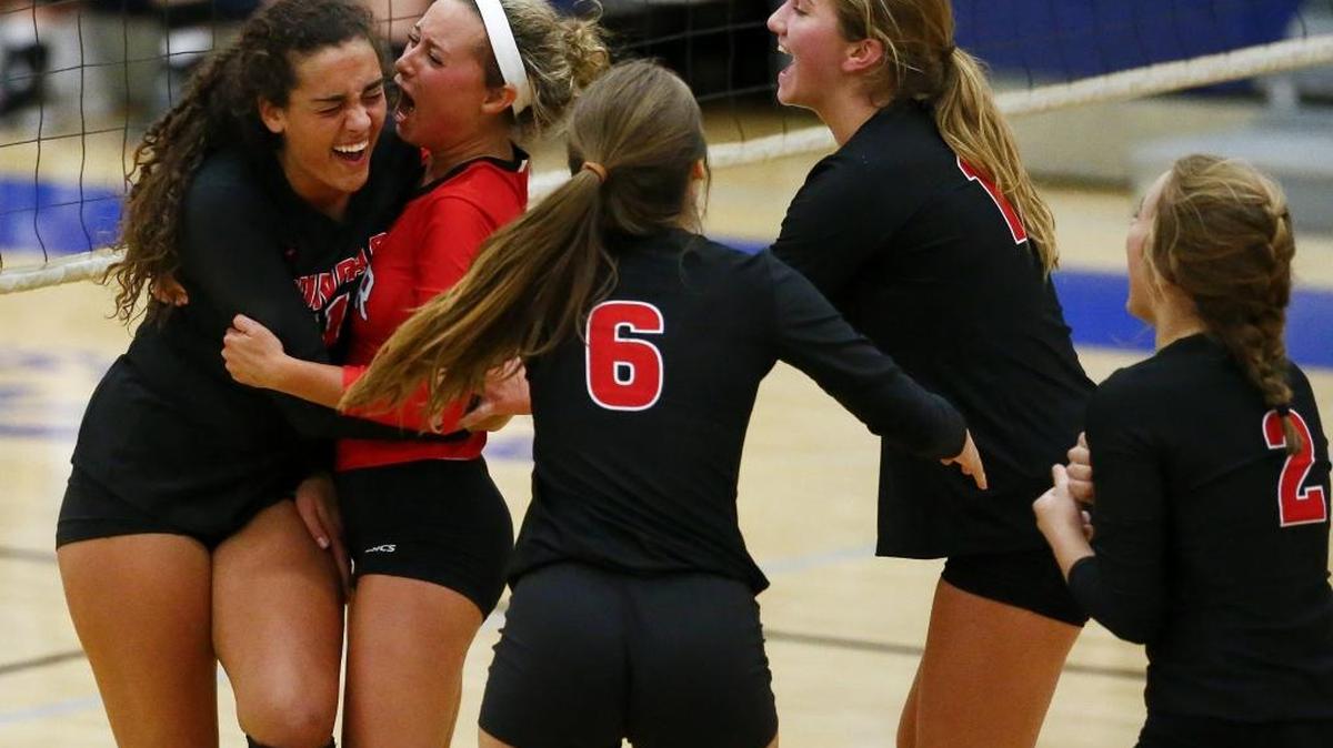 Paul Laurence Dunbar's Savannah Dudek (11) Allie Chapman (5) Paul Laurence Dunbar's Macy Jundi (6) Meredith Phillips (12) and Lauren Spanyer (2) celebrate during their game against Henry Clay at Henry Clay High School in Lexington, Ky., Wednesday, Sept. 6, 2017.