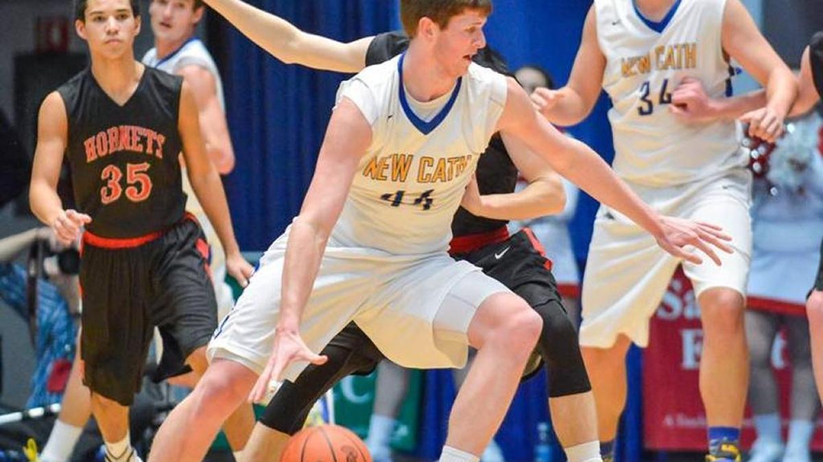 Newport Central Catholic's Ben Weyer drives with the ball against Hancock County, during the opening round of the boys Touchstone Energy All-A Classic, in Frankfort, Thursday, January 29, 2015.