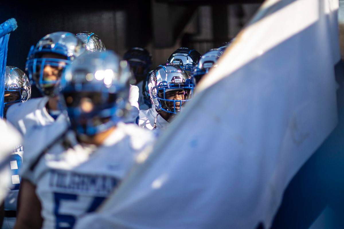 Paducah Tilghman fans wait to take the field before the 2021 UK Orthopaedics State Football Finals Class 3A championship game at Kroger Field in Lexington, Ky., on Saturday, Dec. 4, 2021.