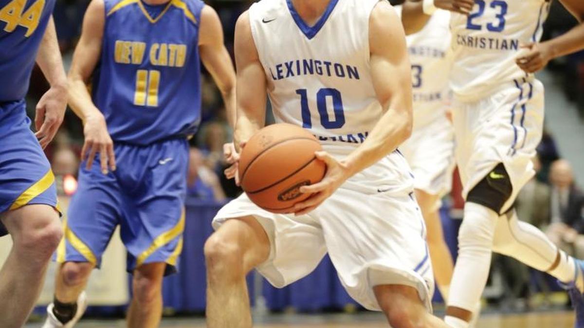 LCA's Trevor Hill (10) went for the basket in the first quarter of the All "A" Classic First round boys basketball game between Newport Central Catholic and LCA at the Frankfort Convention Center in Frankfort, Ky, on Jan. 28, 2016. Newport Central Catholic beat LCA 69-48.
