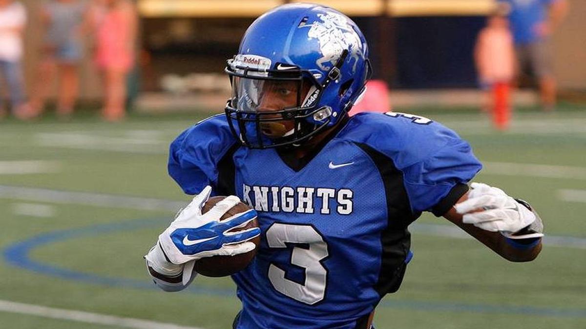 LexCath's JJ Ogbogu runs against Johnson Central at Lexington Catholic football stadium in Lexington, Ky., on Friday, September 4, 2015.