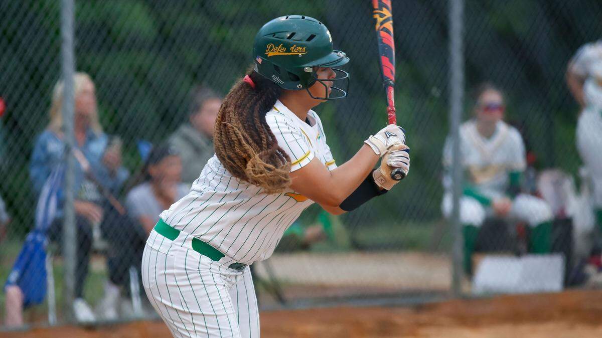 Bryan Station’s Michelle Moore watched the trajectory of her hit against Henry Clay in the Defenders’ 11-0 win over the Blue Devils at Bryan Station High School on Monday.