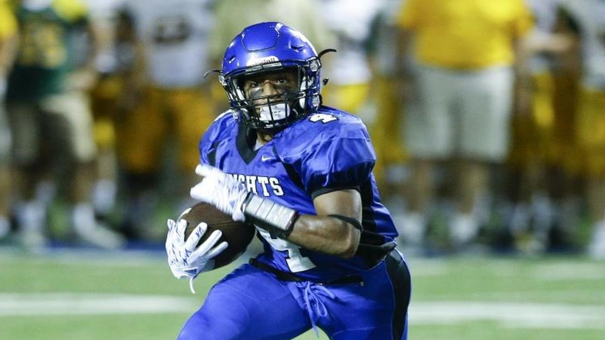 Lexington Catholic's Dameon Jones ran through the St. Xavier defense for a touchdown on Aug. 26 in Lexington.