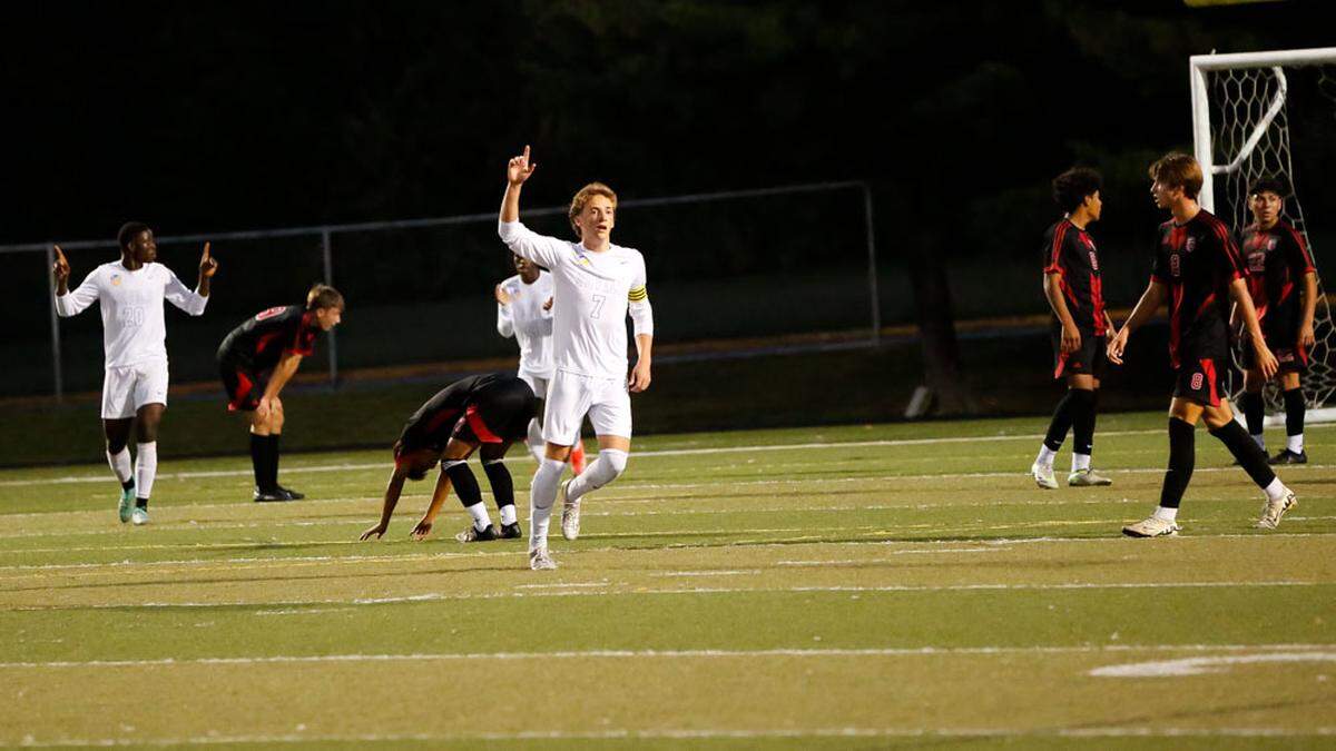 Henry Clay’s Marco Messerli (7) celebrates after striking for the first goal of the game in the Blue Devils’ 4-1 win at Paul Laurence Dunbar High School on Tuesday.