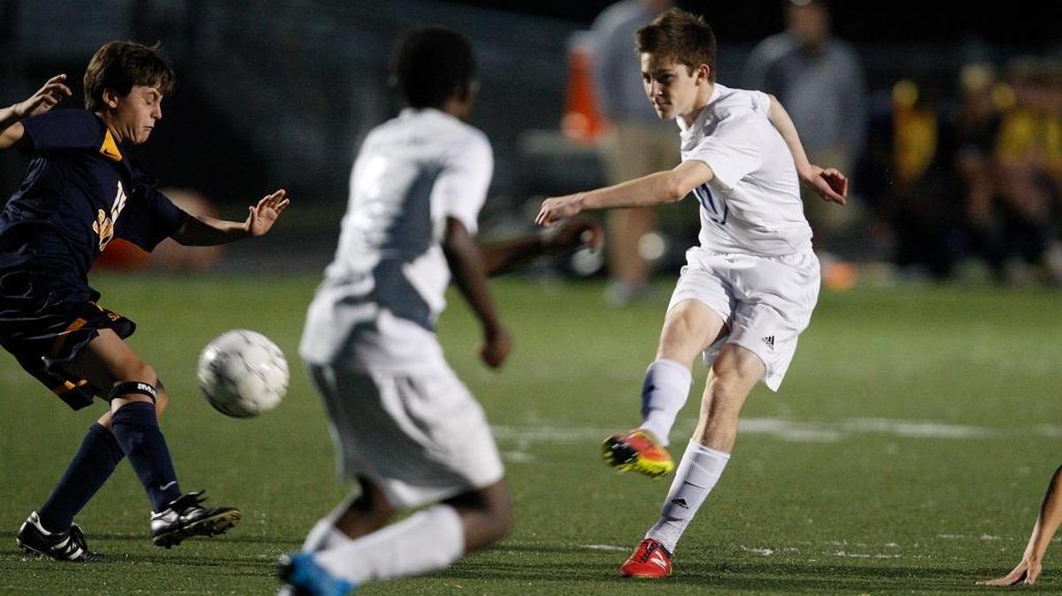 Henry Clay's Ethan MacGillivray shoots on goal to score against Sayre in the 42nd district semifinal at Henry Clay soccer field in Lexington, Ky., Monday, October 10, 2016.