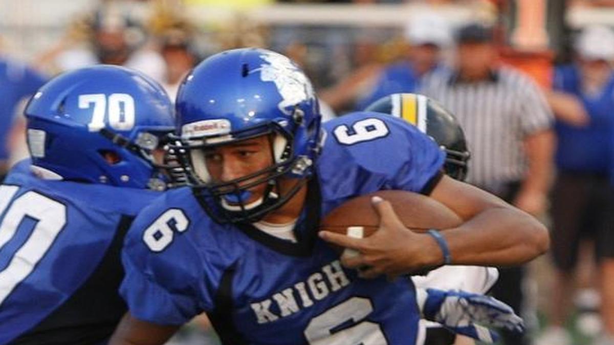LexCath quarterback Legend Brumbaugh ran against Johnson Central at Lexington Catholic football stadium in Lexington, Ky., Friday, September 4, 2015. Photo by Matt Goins
