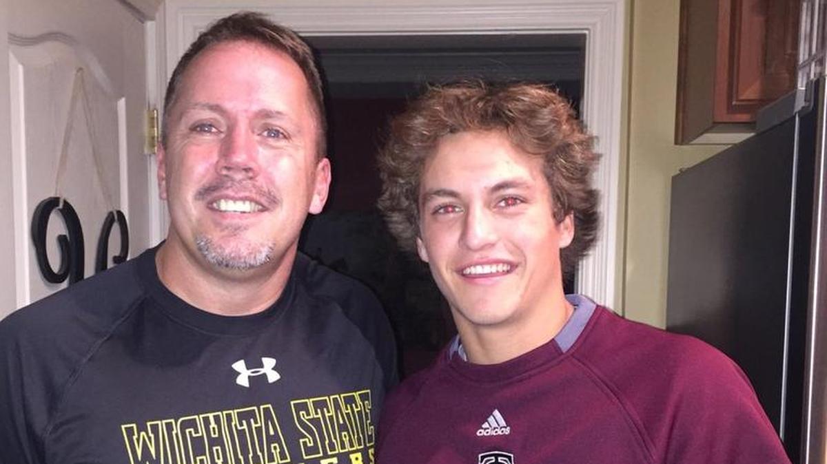 Tates Creek assistant coach Shawn Yeary, left, and junior catcher Colin Burgess.