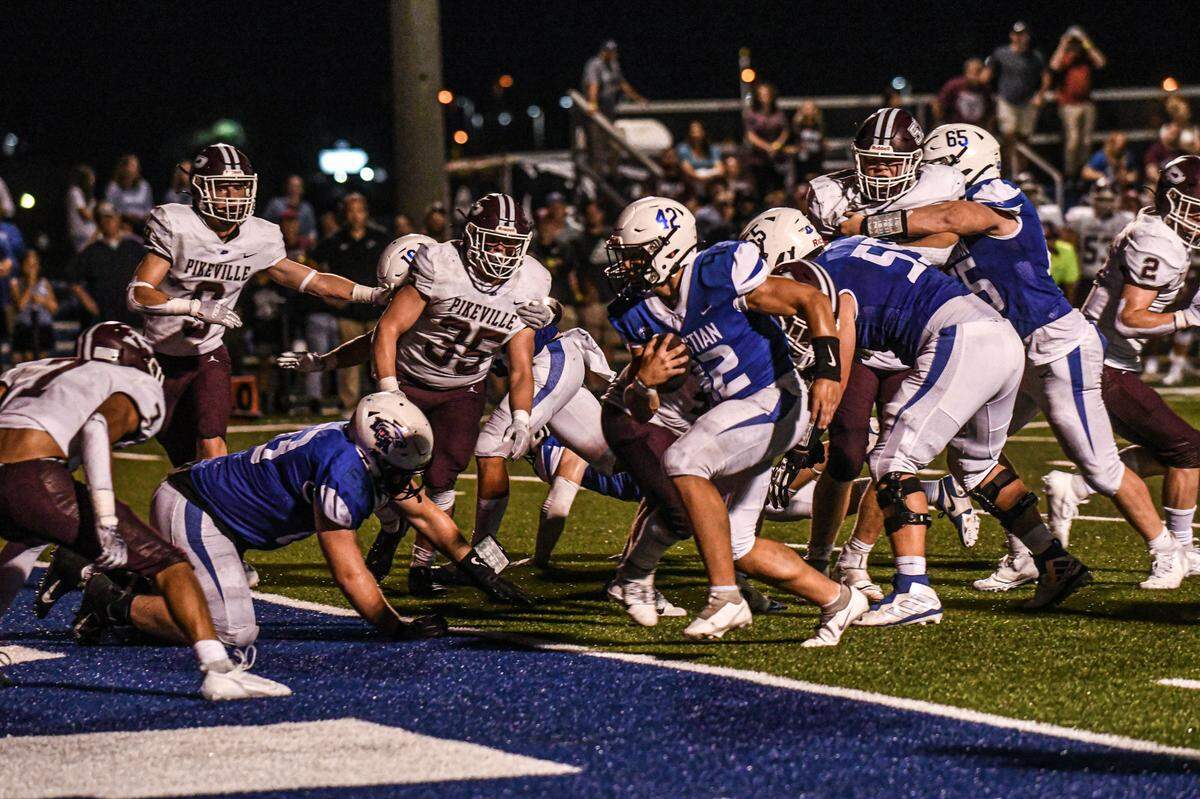 Lexington Christian’s Brady Hensley runs into the end zone for one of his four touchdowns against Pikeville on Saturday at White, Greer & Maggard Stadium.