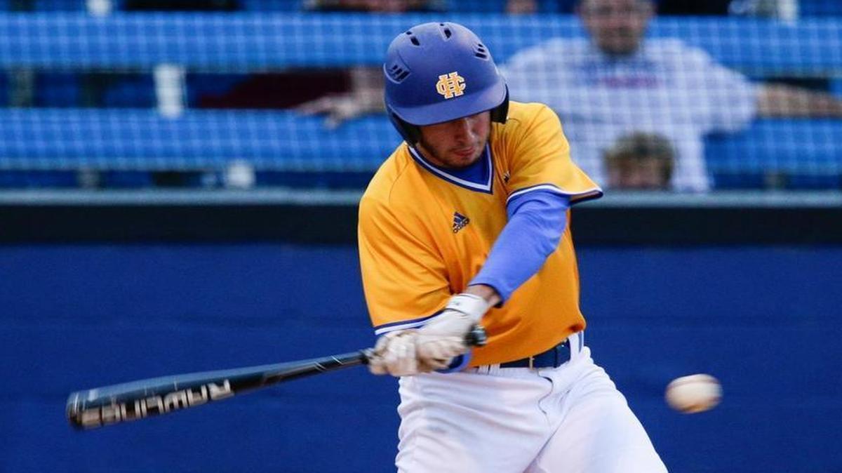 Henry Clay’s Luke Wilson took a swing as the Blue Devils played Scott County in April. Wilson struck out eight batters and gave up only three hits, throwing a complete game against Lafayette in the 11th Region first round on Monday.