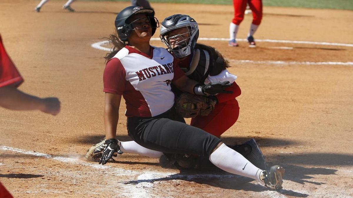 Scott County catcher Jordan Ison tagged McCracken County’s KiKi Telfair out at home at Lois Holmes Field in Georgetown on Saturday, April 16, 2016.