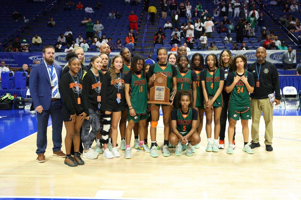Frederick Douglass, Central Kentucky’s 11th Region champions, accepted its state semifinalist trophy at the Clark’s Pump-N-Shop Girls’ Sweet 16 state tournament at Rupp Arena on Saturday.