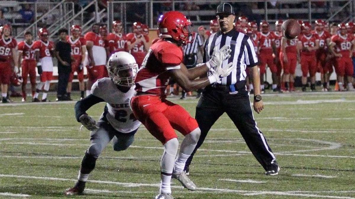 Glenn Covington caught a pass and evaded Lafayette's Cameron Morgan for a Scott County touchdown. Scott County hosted Lafayette High School on September 16, 2016.
