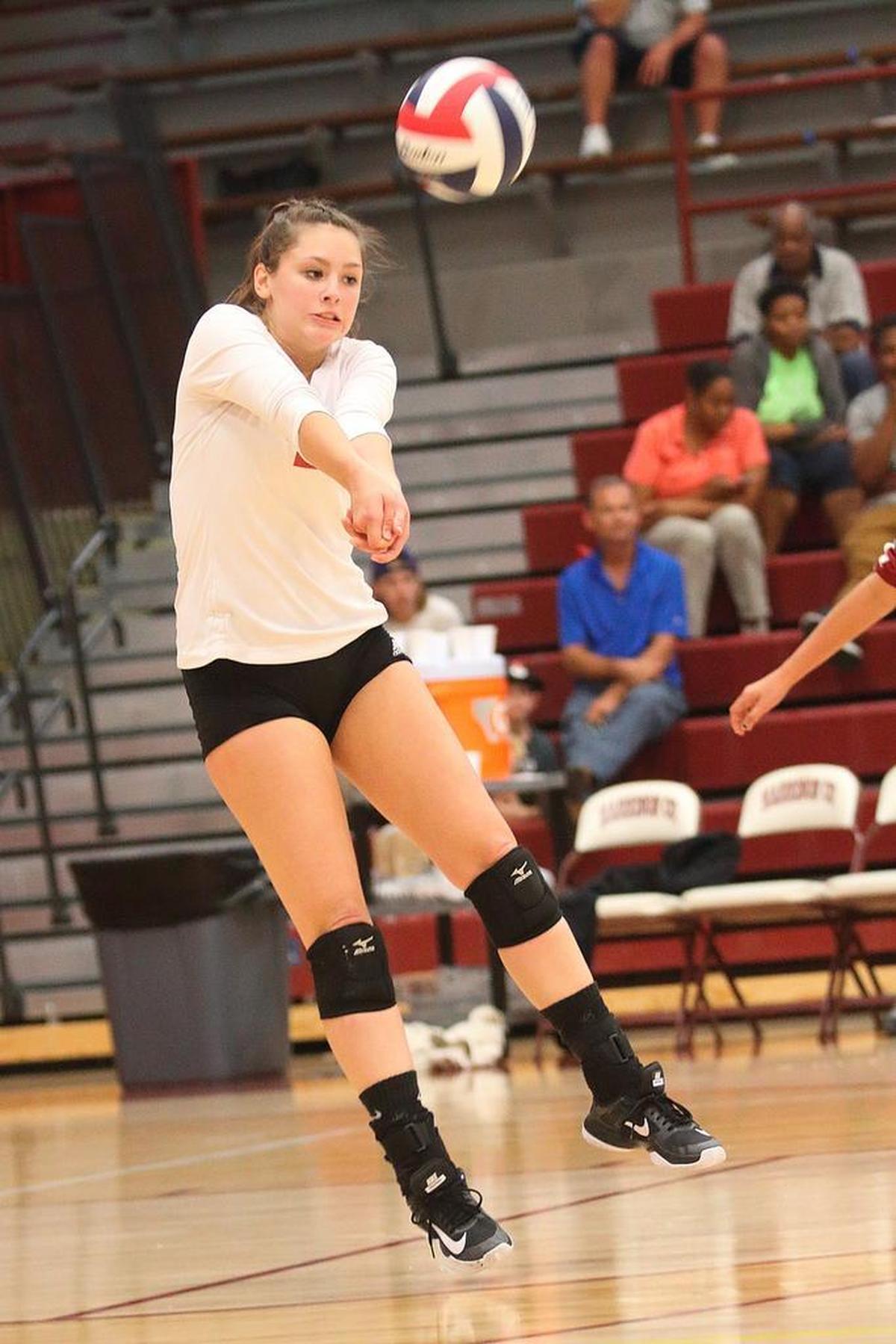 Harrison County libero Emma Wallace struck the ball during a high school volleyball match. The Fillies are undefeated heading into a match with Scott High School scheduled for Thursday, Oct. 12, 2017.