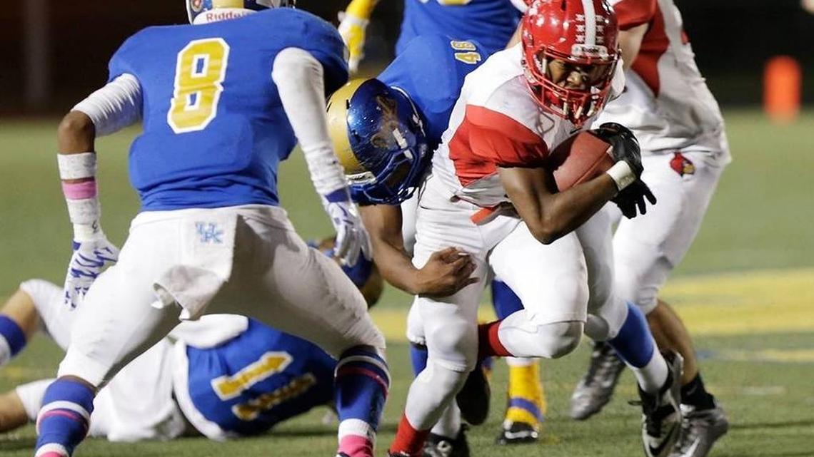 Junior defensive lineman and running back Ray-Karl Irving (48, making tackle) is expected to contribute for Henry Clay this year.
