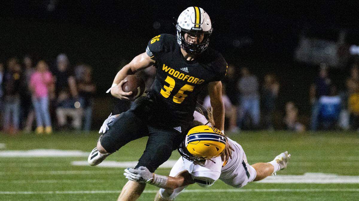 Woodford County’s Preston Stacy tries to break free from a tackle during a game last season. Coach Dennis Johnson calls the senior the most underrated running back in the state.