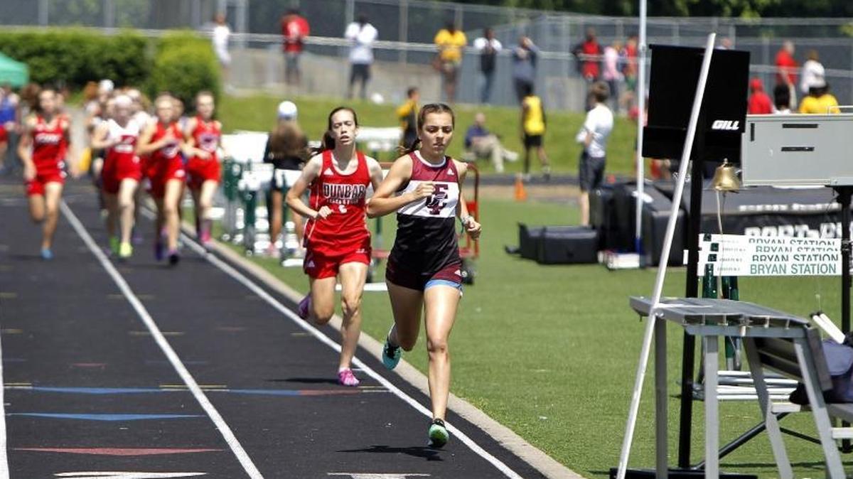 Tates Creek's Jenna Strange, front, won the 800m girls' race at the Fayette County Track and Field championships on Tuesday.