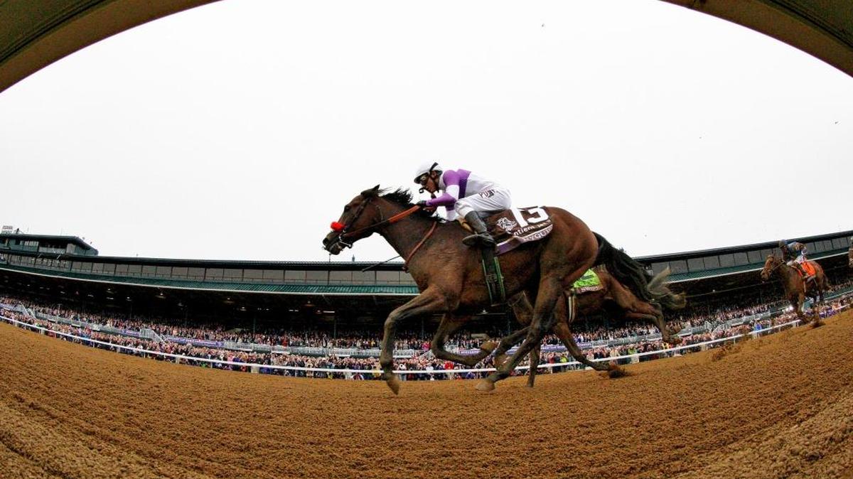 Nyquist with Mario Gutierrez up, inside, out ran Swipe and Victor Espinoza to win the Sentient Jet Breeders' Cup Juvenile at the 2015 Breeders' Cup at Keeneland Race Course Saturday October 31, 2015.
