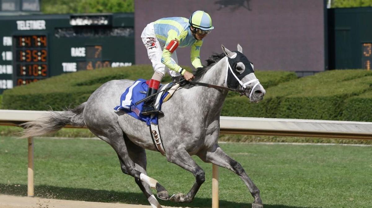 Jockey John Velazquez stands up on Race Day after the horse won the $600,000 Oaklawn Handicap at Oaklawn Park in Hot Springs, Ark., Saturday, April 11, 2015. (AP Photo/Danny Johnston)