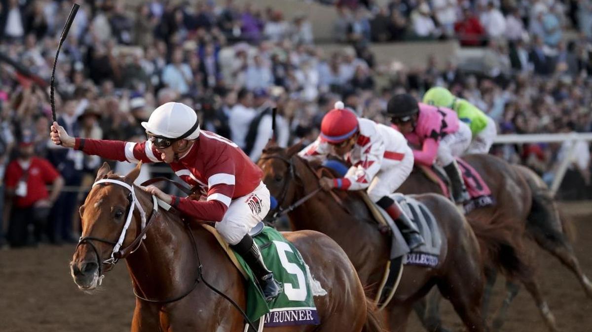 Florent Geroux, left, rode Gun Runner to victory in the 2017 Breeders’ Cup Classic at Del Mar last November.