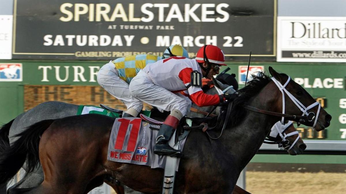 Jockey John Velazquez rode We Miss Artie (11) to a come-from-behind victory in the Spiral Stakes at Turfway Park in 2014. The race has produced two Kentucky Derby winners.