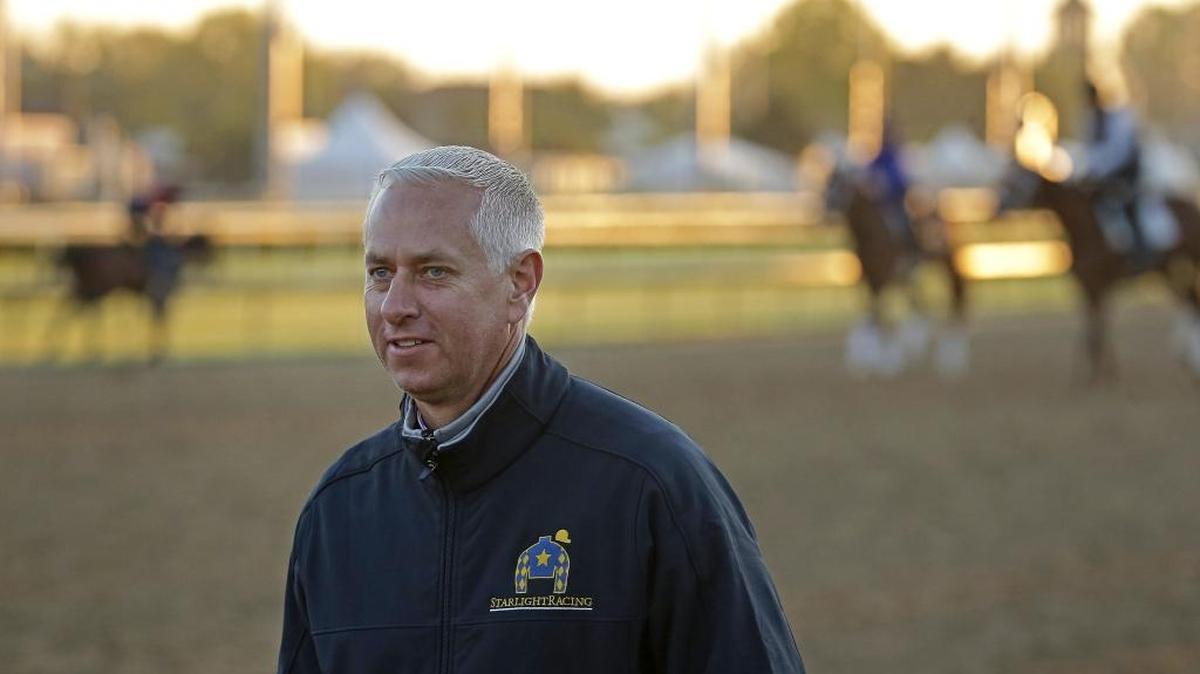 FILE - In this April 29, 2015, file photo, trainer Todd Pletcher watches horses train on the track at Churchill Downs in Louisville, Ky. Entering Saturday’s, Feb. 28, $400,000 Fountain of Youth Stakes at Gulfstream Park, Pletcher has just one 3-year-old among the top 50 in the Derby point standings - Destin with 1 point. The acclaimed trainer hopes to change that when he sends out Zulu to take on favorite Mohaymen in the Fountain of Youth, a 1 1/16th-mile Derby prep race with 50 points to the winner, 20 for second, 10 for third and 5 for fourth.