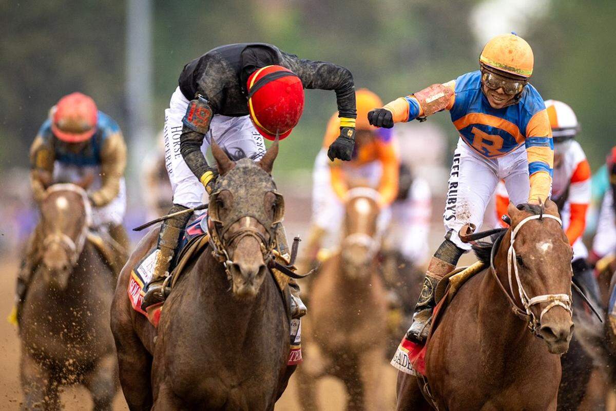 Jose Ortiz rides Golden Tempo (center) to a win in the 152nd Kentucky Derby at Churchill Downs on Saturday, May 2, 2026.