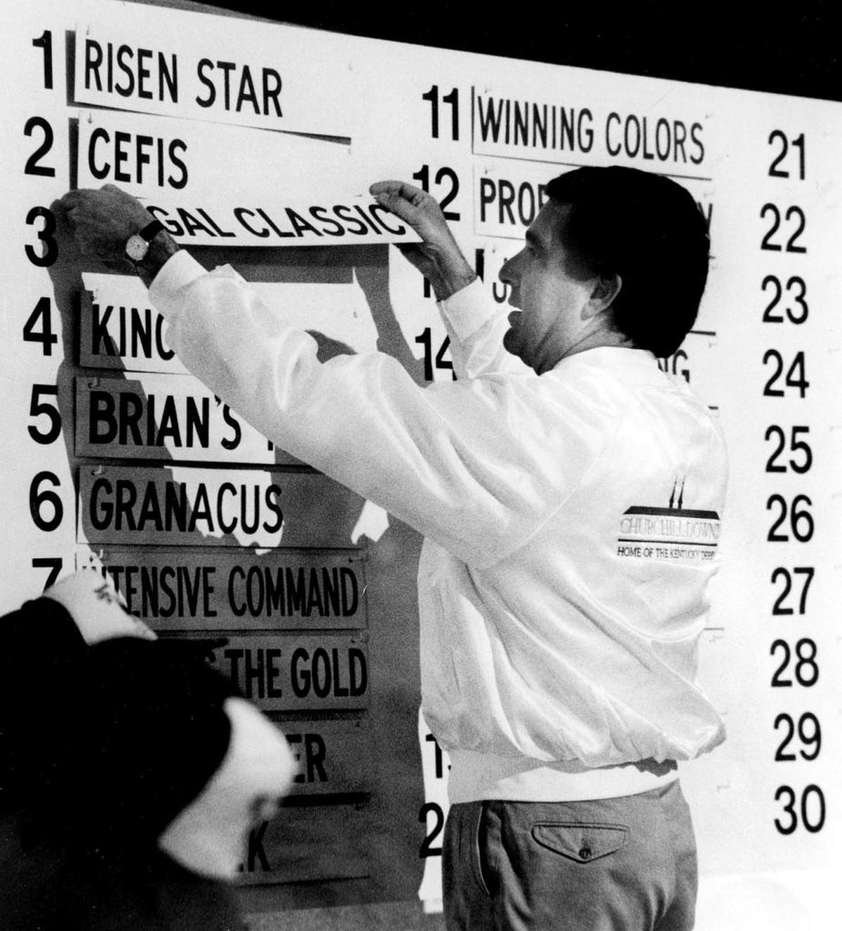 Louisville Mayor Jerry Abramson put names on the board during the 1988 Kentucky Derby draw. Risen Star finished third that year, and he remains the last horse to hit the board from the No. 1 post.