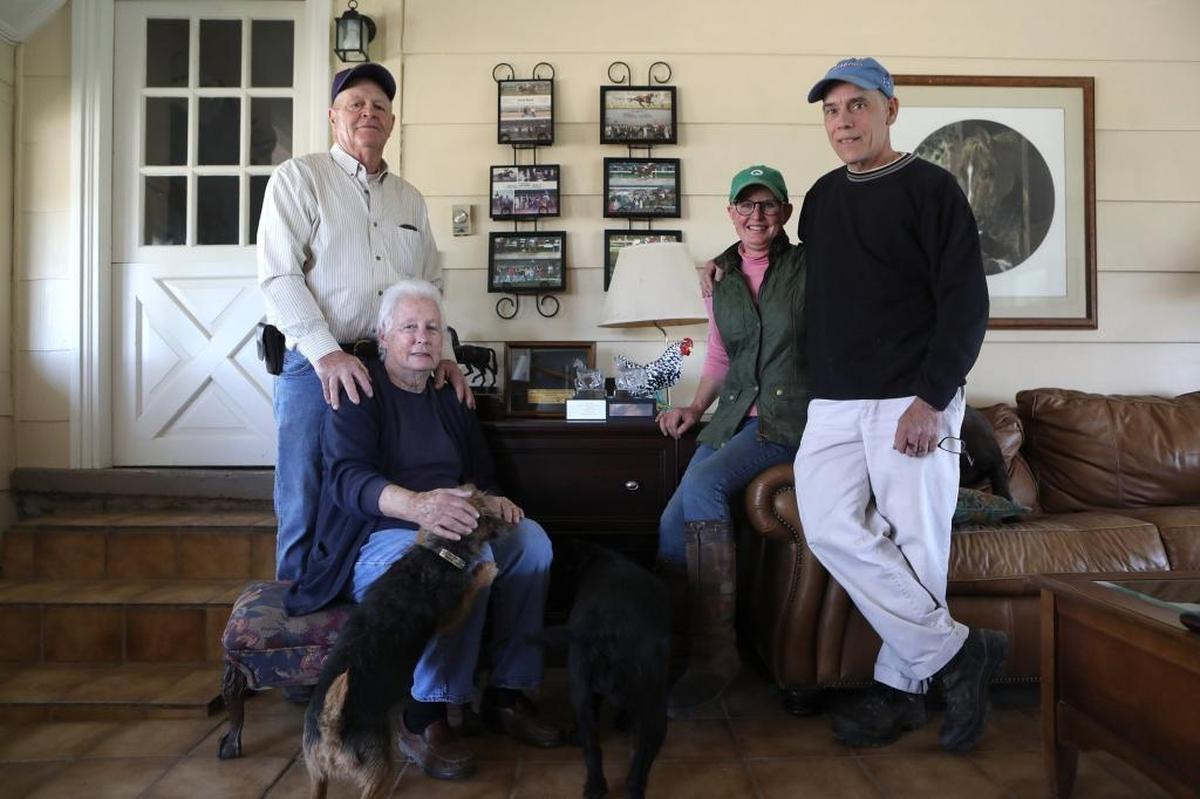 Fred and Nancy Mitchell with Nancy’s daughter Marty Buckner and her husband Matthew Ernest and their dogs at Clarkland Farm.