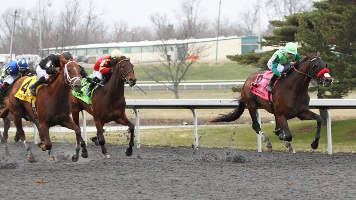 Blended Citizen and jockey Kyle Frey held on to win Saturday’s Jeff Ruby Steaks at Turfway Park