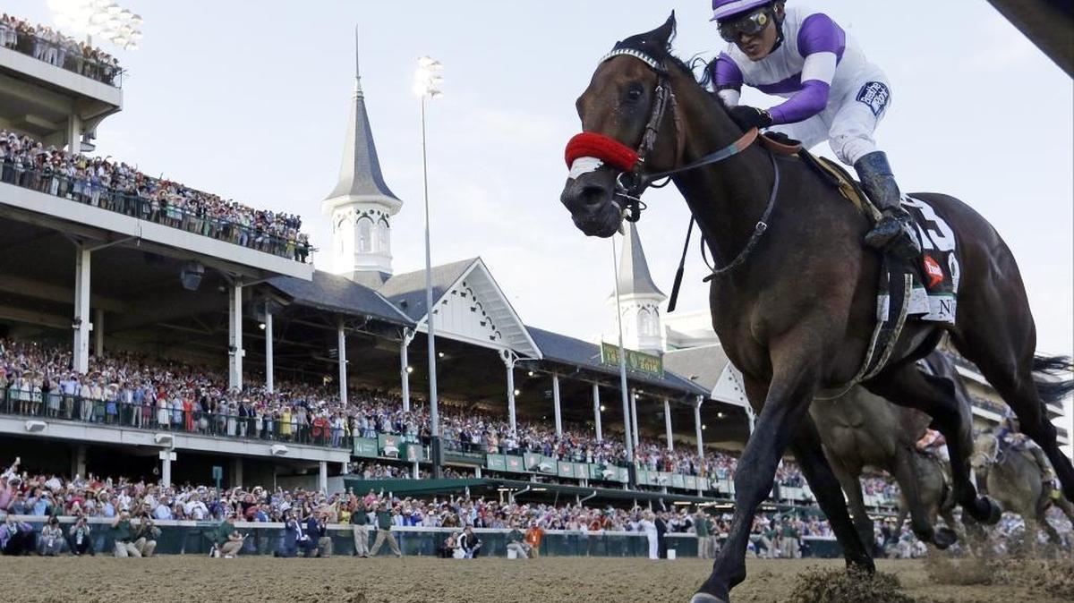 Mario Gutierrez rides Nyquist to victory during the 142nd running of the Kentucky Derby horse race at Churchill Downs in Louisville, Ky.
