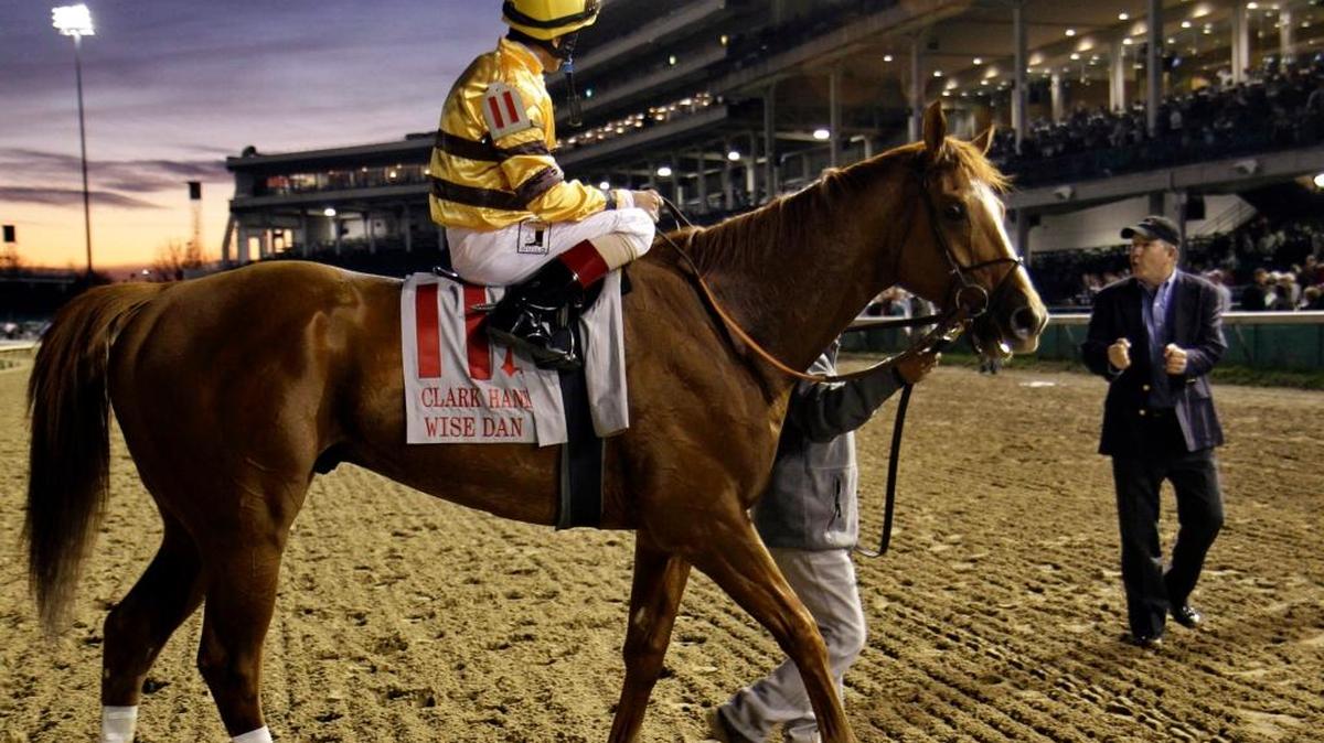 Winning trainer Charles Lopresti, right, gestured as he talked with jockey John Velazquez aboard Wise Dan after winning the Grade I, $500,000 Clark Handicap at Churchill Downs on Friday, Nov. 25, 2011, in Louisville.