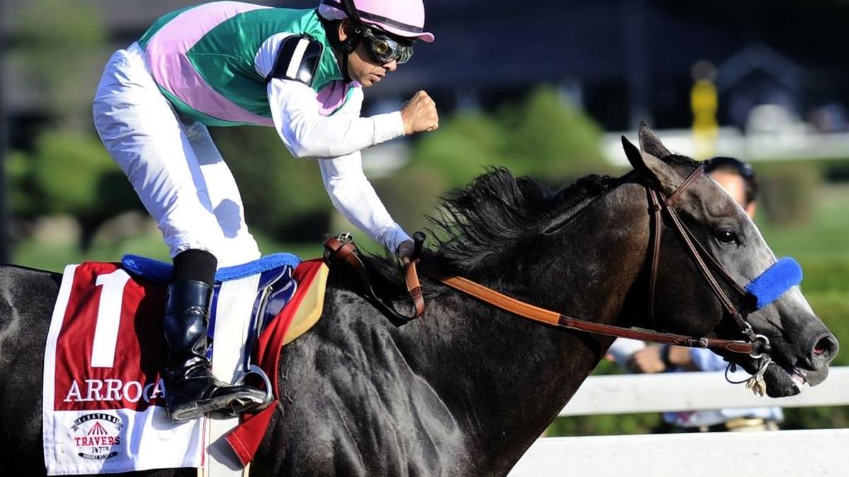 Jockey Mike Smith celebrated aboard Arrogate after winning the Travers Stakes at Saratoga last summer.