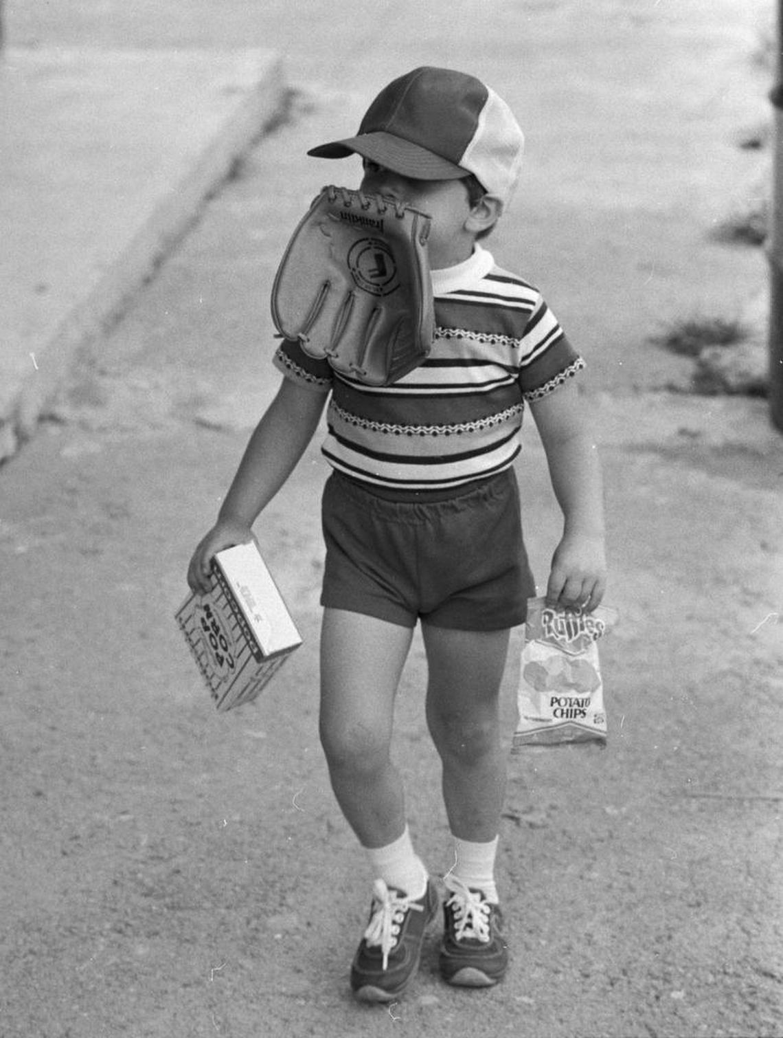 Three-year-old Aaron Crothers of Paintsville headed to his seat in the stands for the opening game of the Paintsville Yankees as they played the Pikeville Brewers in June 1982.
