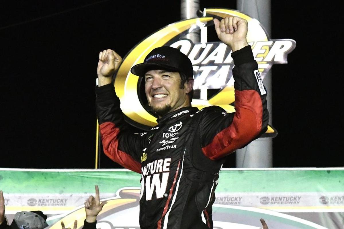 Martin Truex Jr. celebrated in Victory Lane after dominating the 2017 Quaker State 400 at Kentucky Speedway.