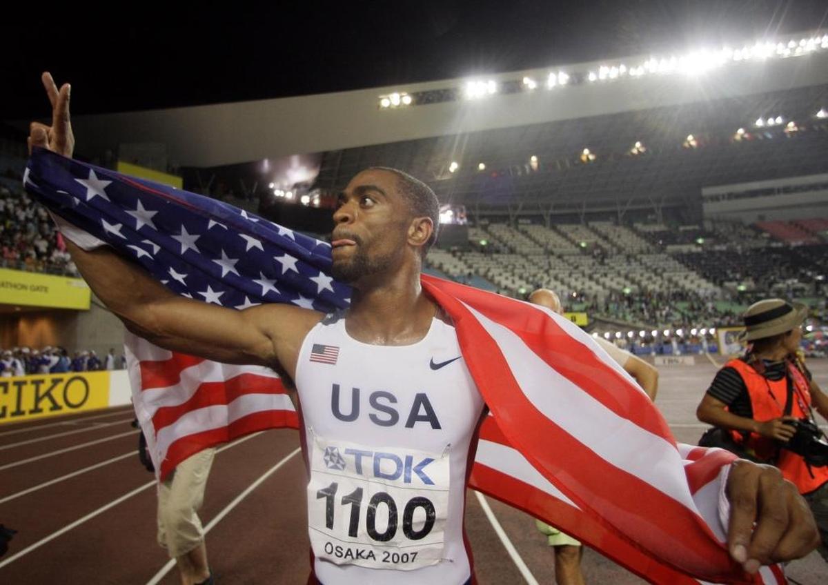 Tyson Gay celebrated after winning the gold medal in the 200 meters at the 2007 World Championships in Japan.