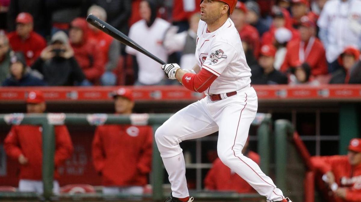The Cincinnati Reds’ Joey Votto hit a two-run single to take the lead in the eighth inning of their opening day baseball game against the Philadelphia Phillies on Monday, April 4, 2016, in Cincinnati.
