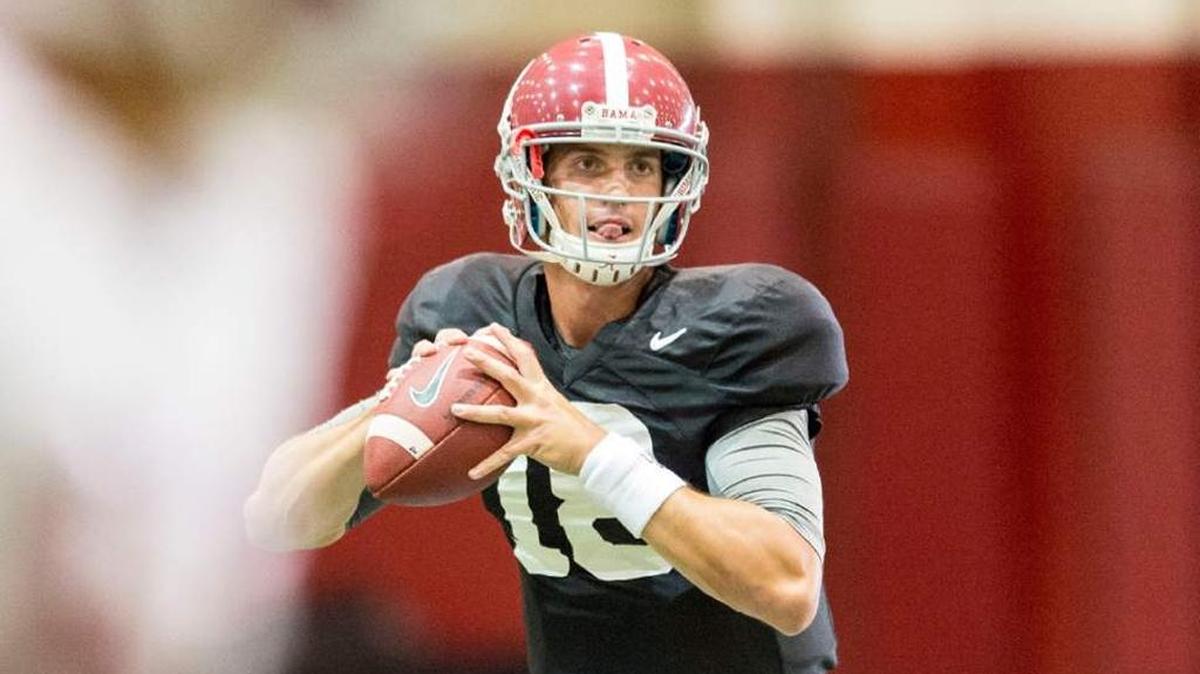 Cooper Bateman is in a battle to be the starting quarterback for defending national champion Alabama. The Crimson Tide opens the season Sept. 3 against USC in Arlington, Texas.