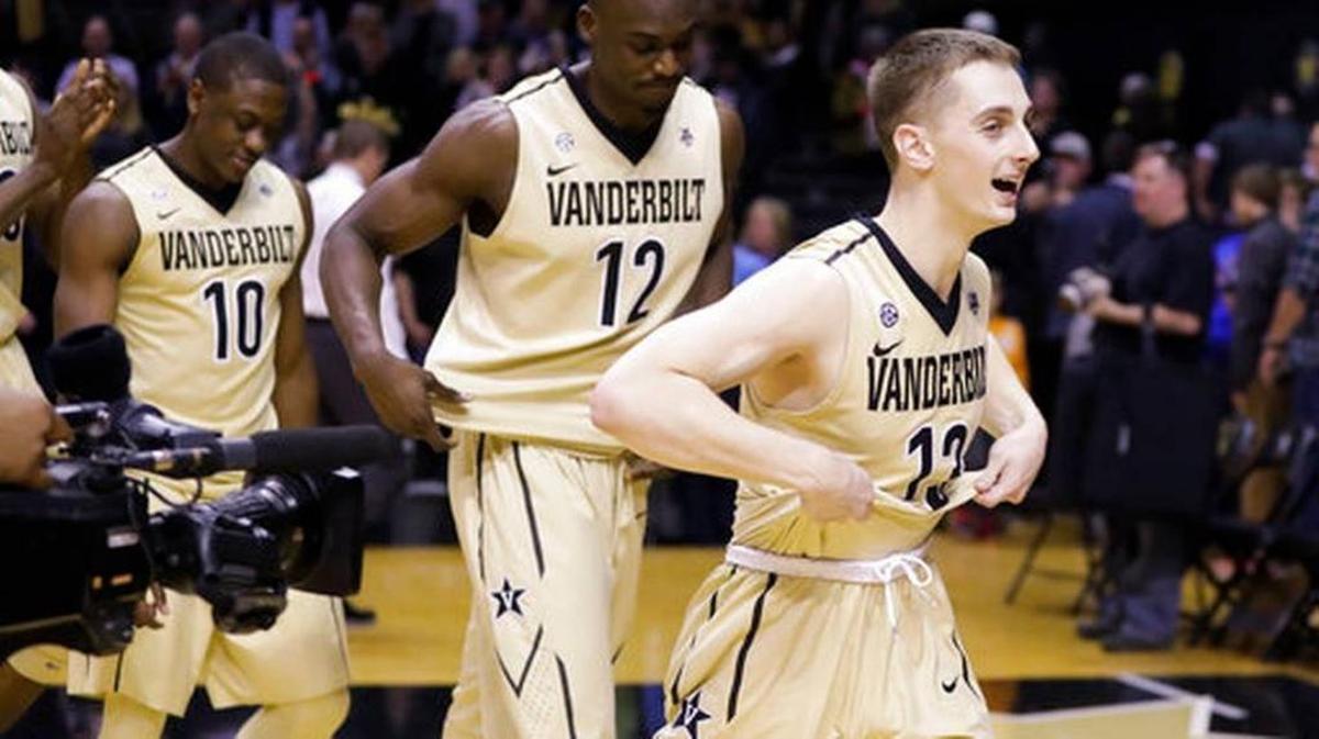 Vanderbilt’s Riley LaChance (13) celebrates the Commodores’ 71-68 win over Florida on Saturday, Feb. 17 in Nashville, Tenn.